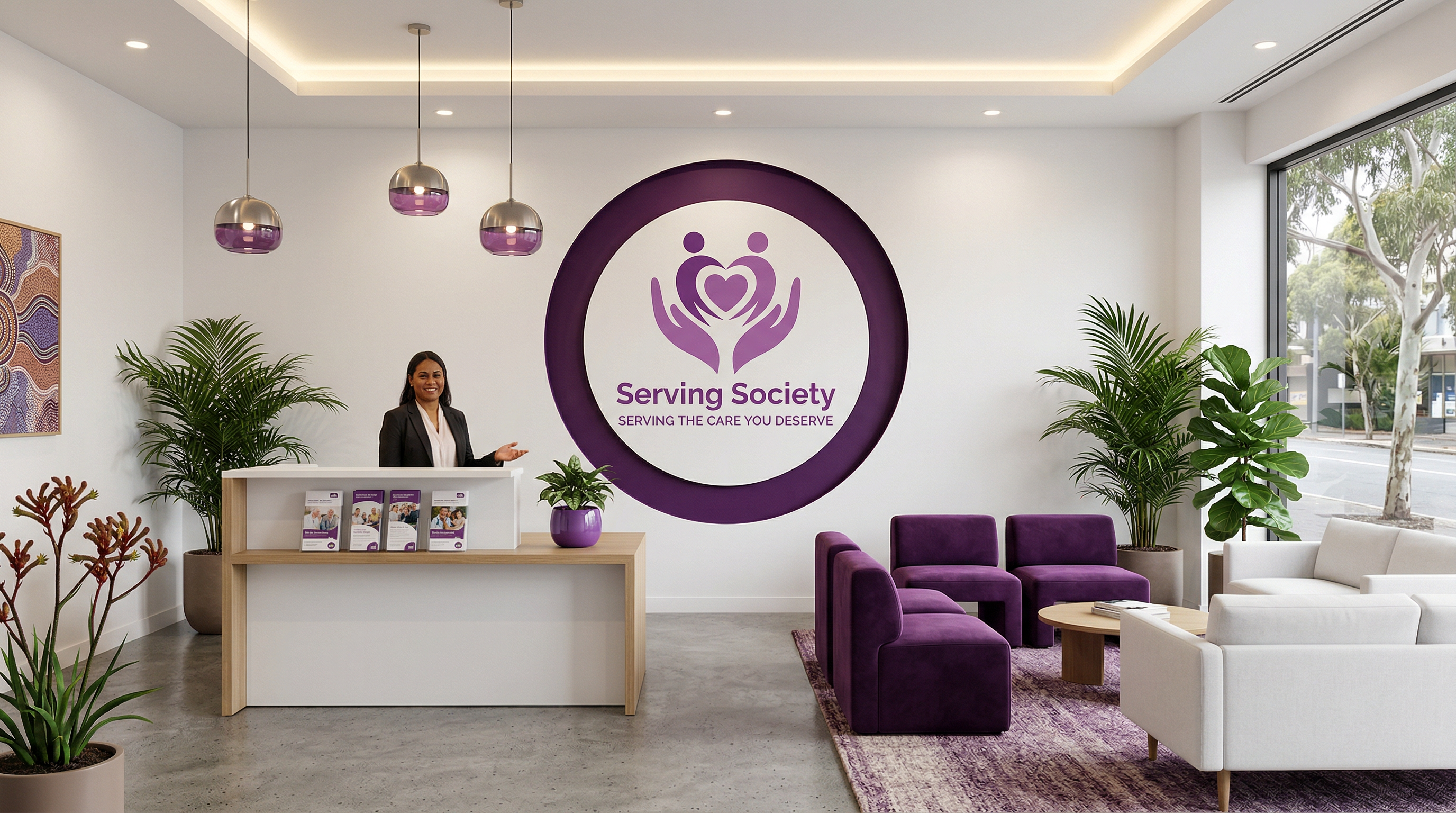 Serving Society office reception with logo on wall